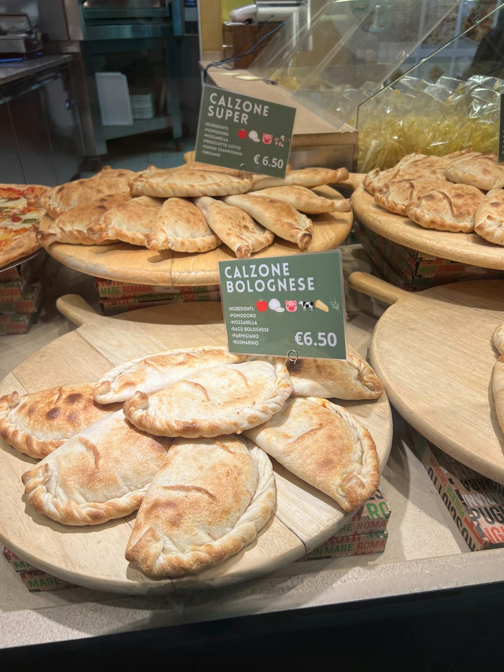 a display case filled with lots of pies