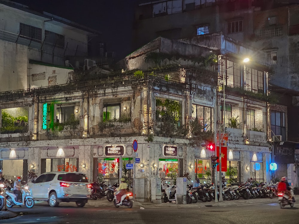 a group of motorcycles parked in front of a building