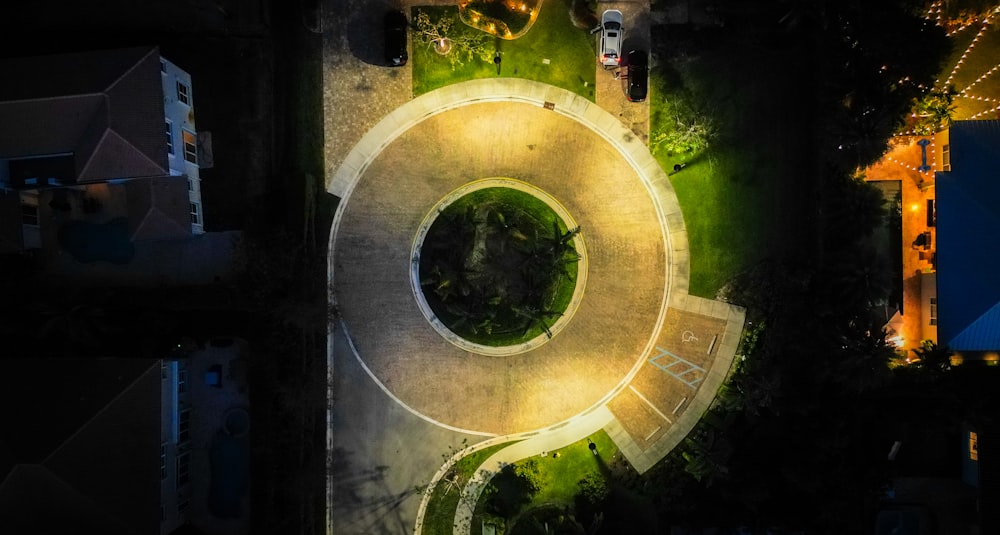 an aerial view of a street at night