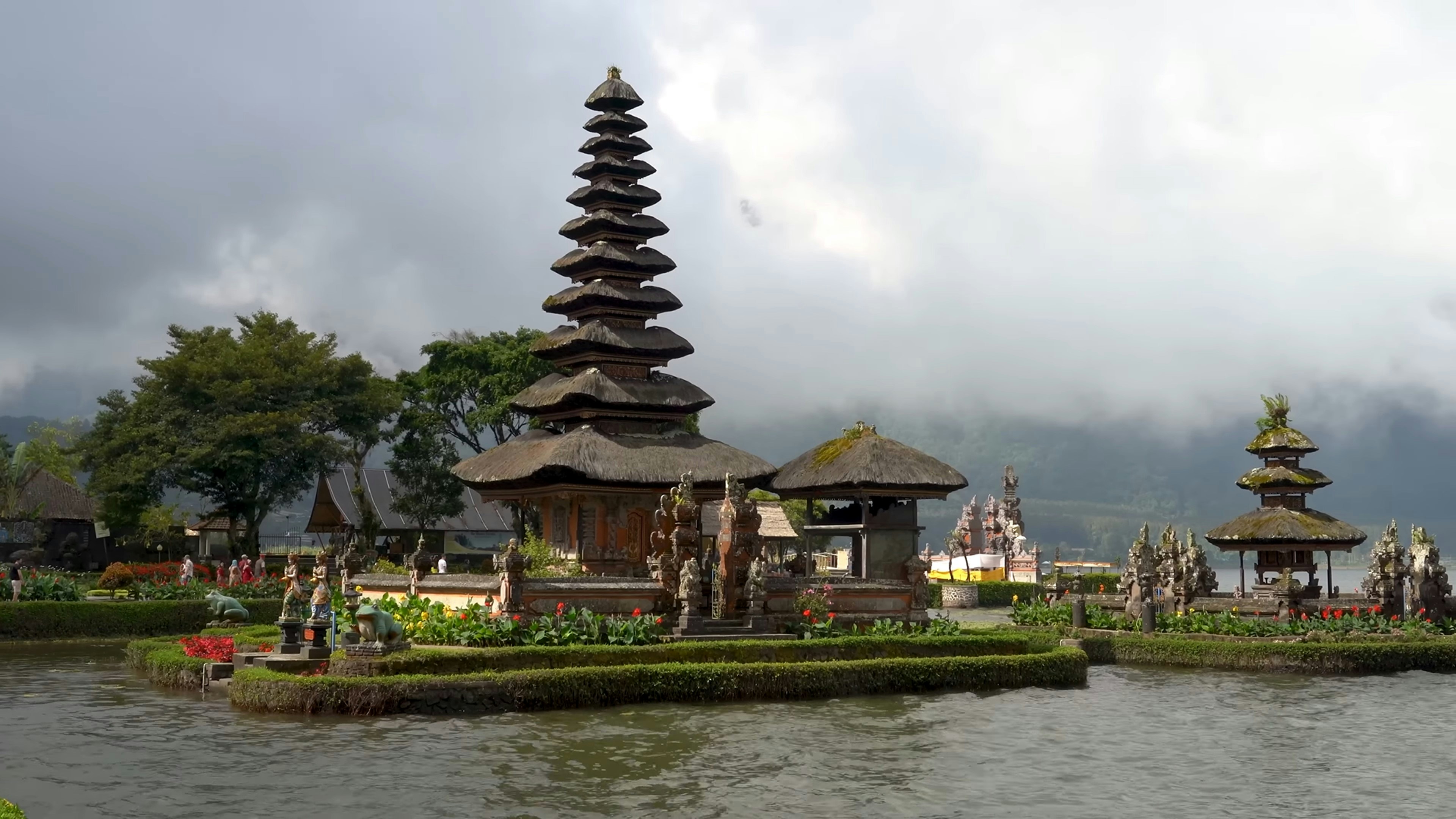 a body of water with a bunch of buildings on it - Bedugul - Bali