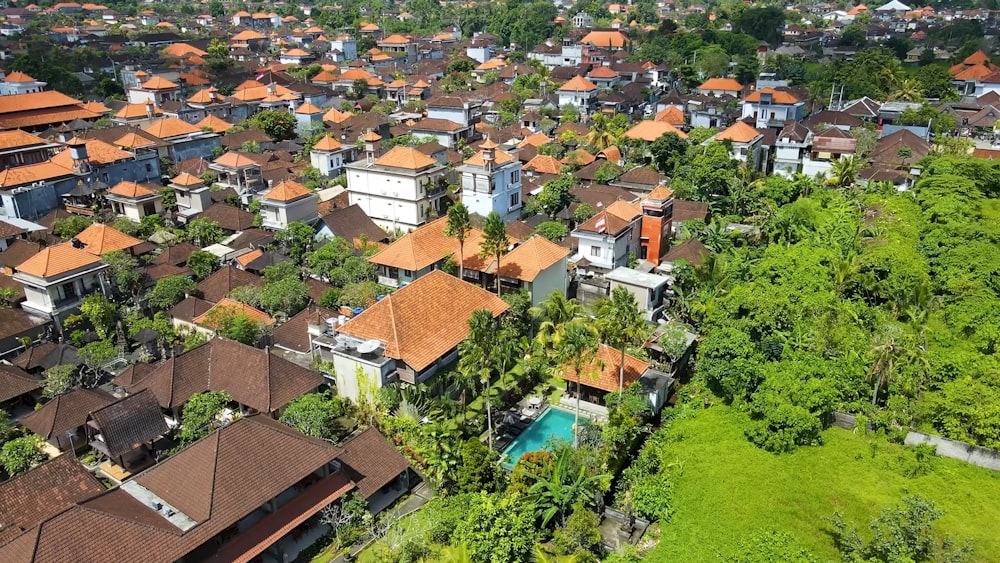 an aerial view of a city with lots of houses