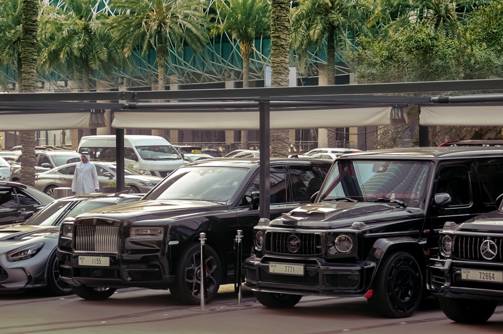 a bunch of cars parked next to each other