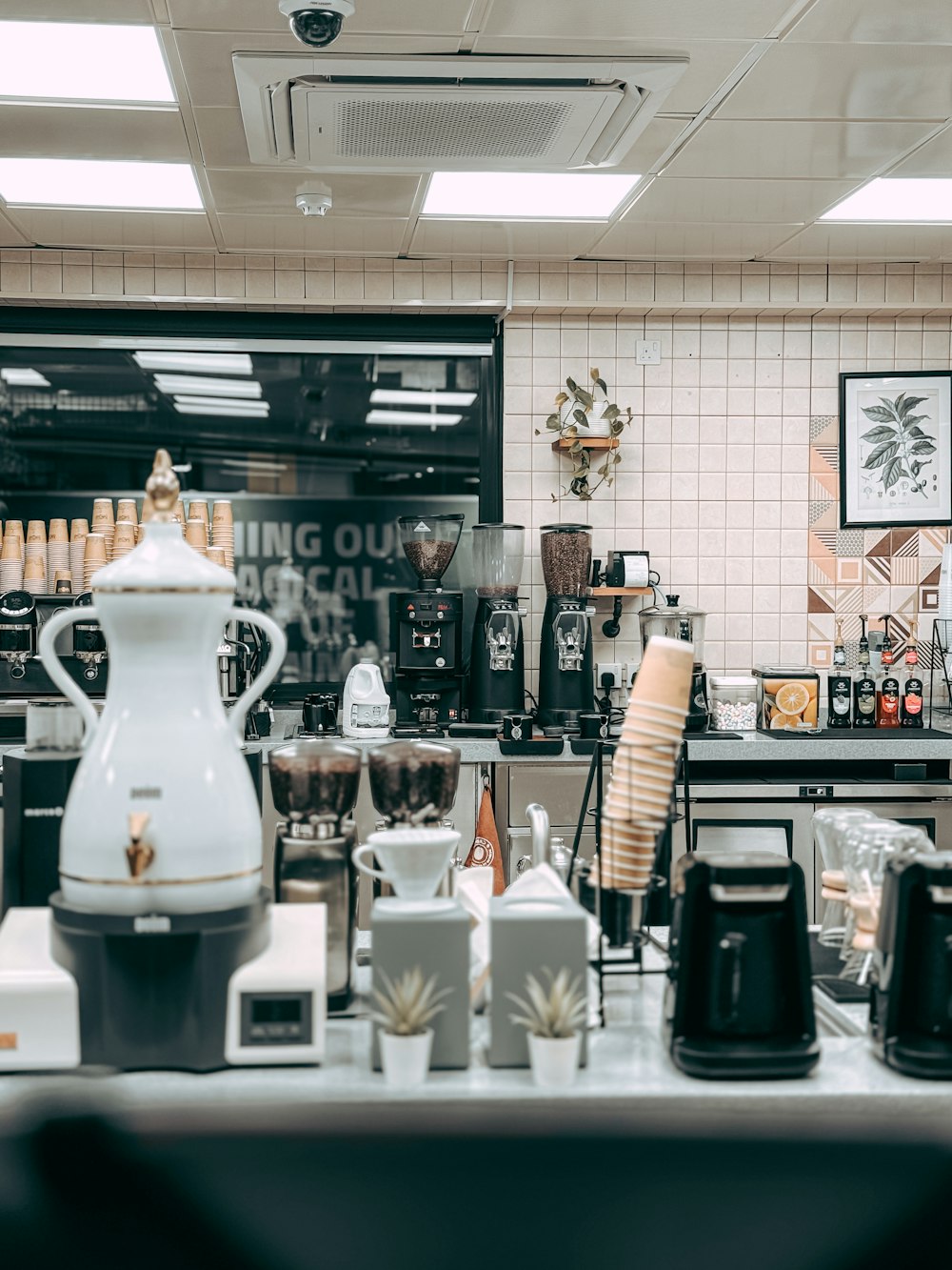 a coffee shop filled with lots of coffee machines