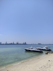 a couple of boats that are sitting in the water
