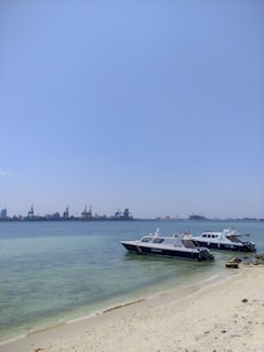 a couple of boats that are sitting in the water