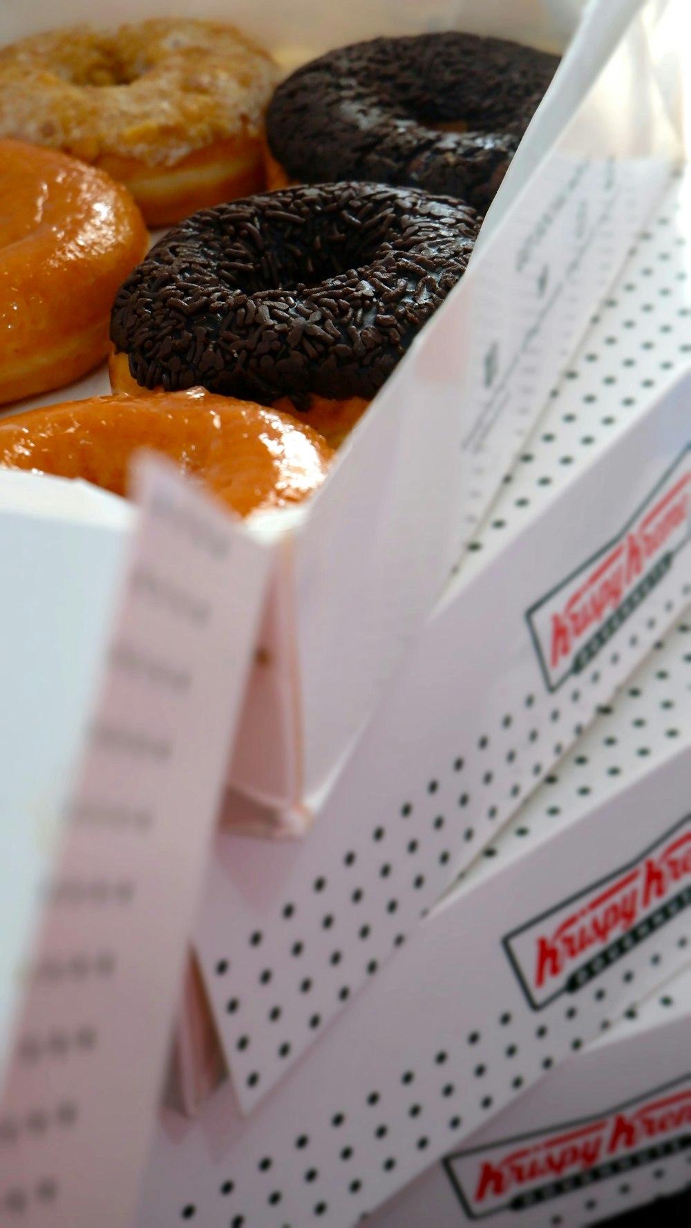 a box filled with lots of different kinds of donuts