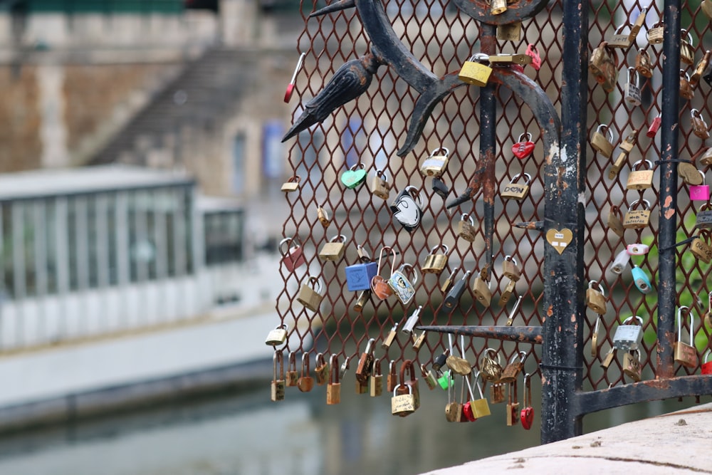 a fence with a bunch of padlocks attached to it