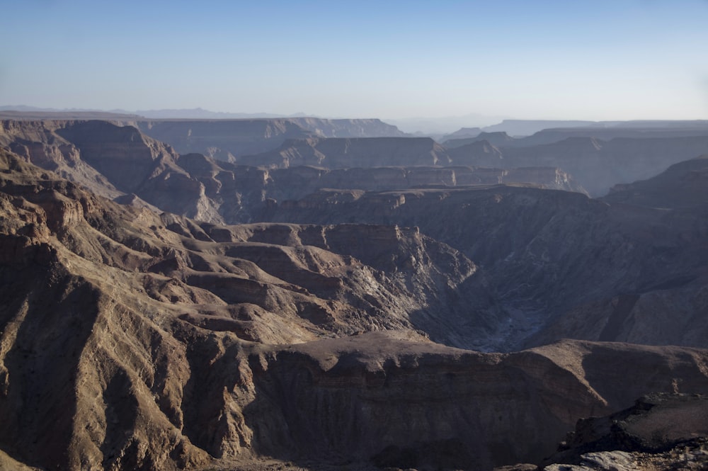 a view of a canyon in the middle of the desert