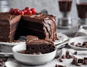 a chocolate cake with a slice taken out of it