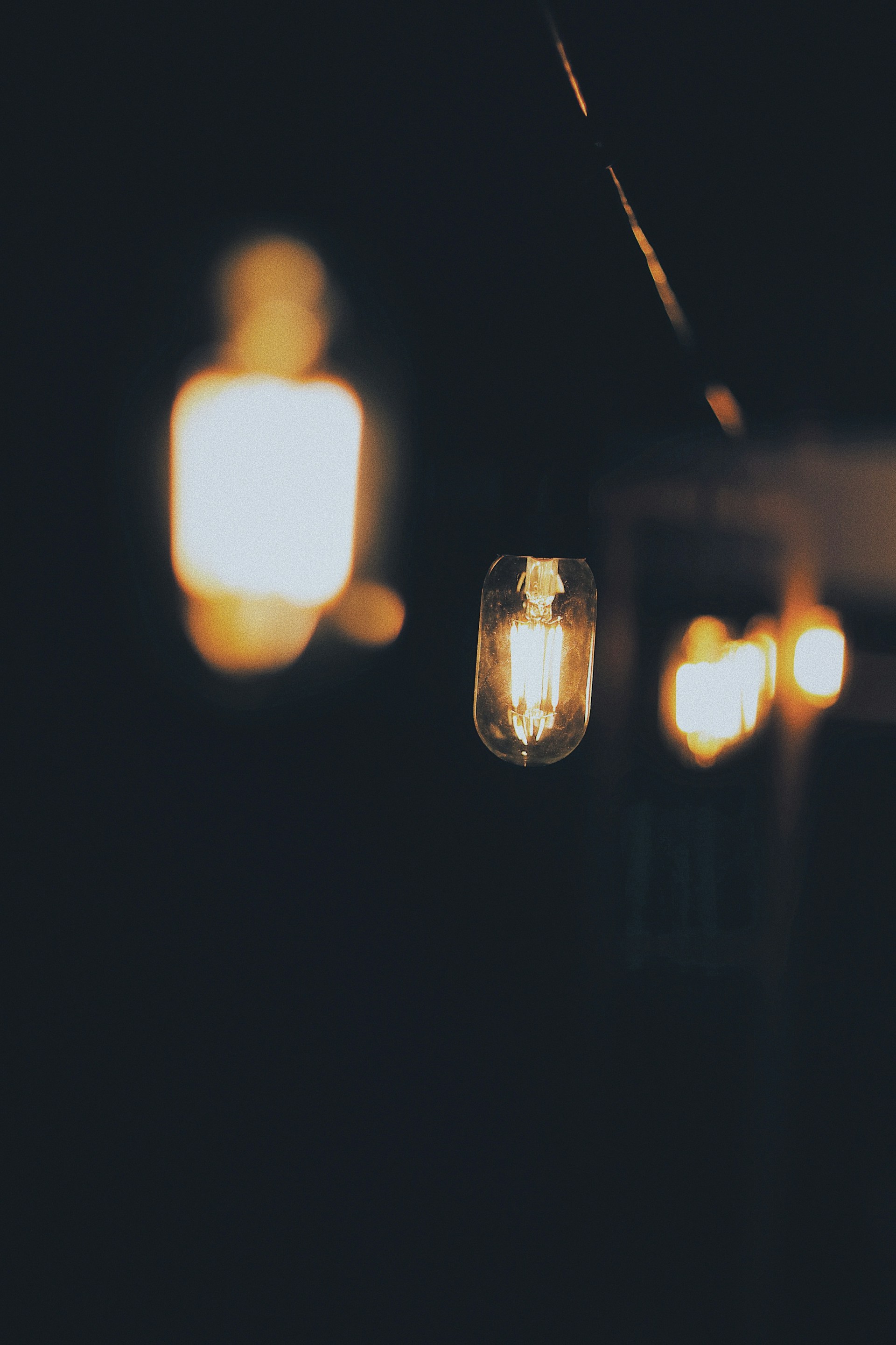 a close up of some lights in the dark