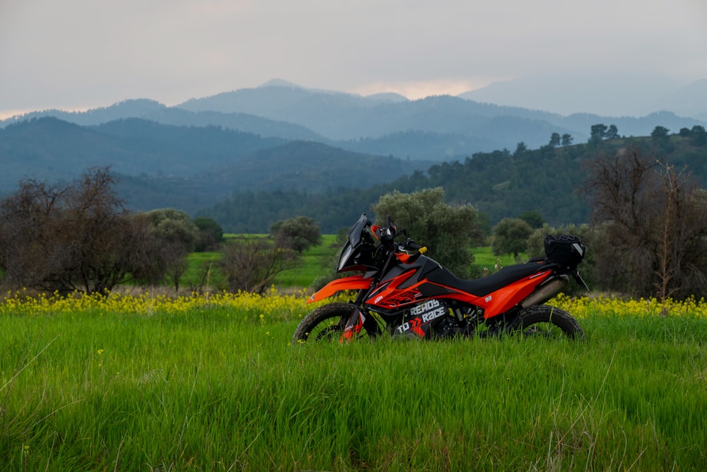 a motorcycle parked in the middle of a field