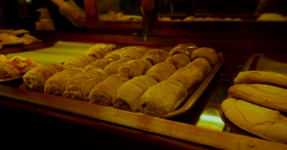 a display case filled with lots of different types of pastries