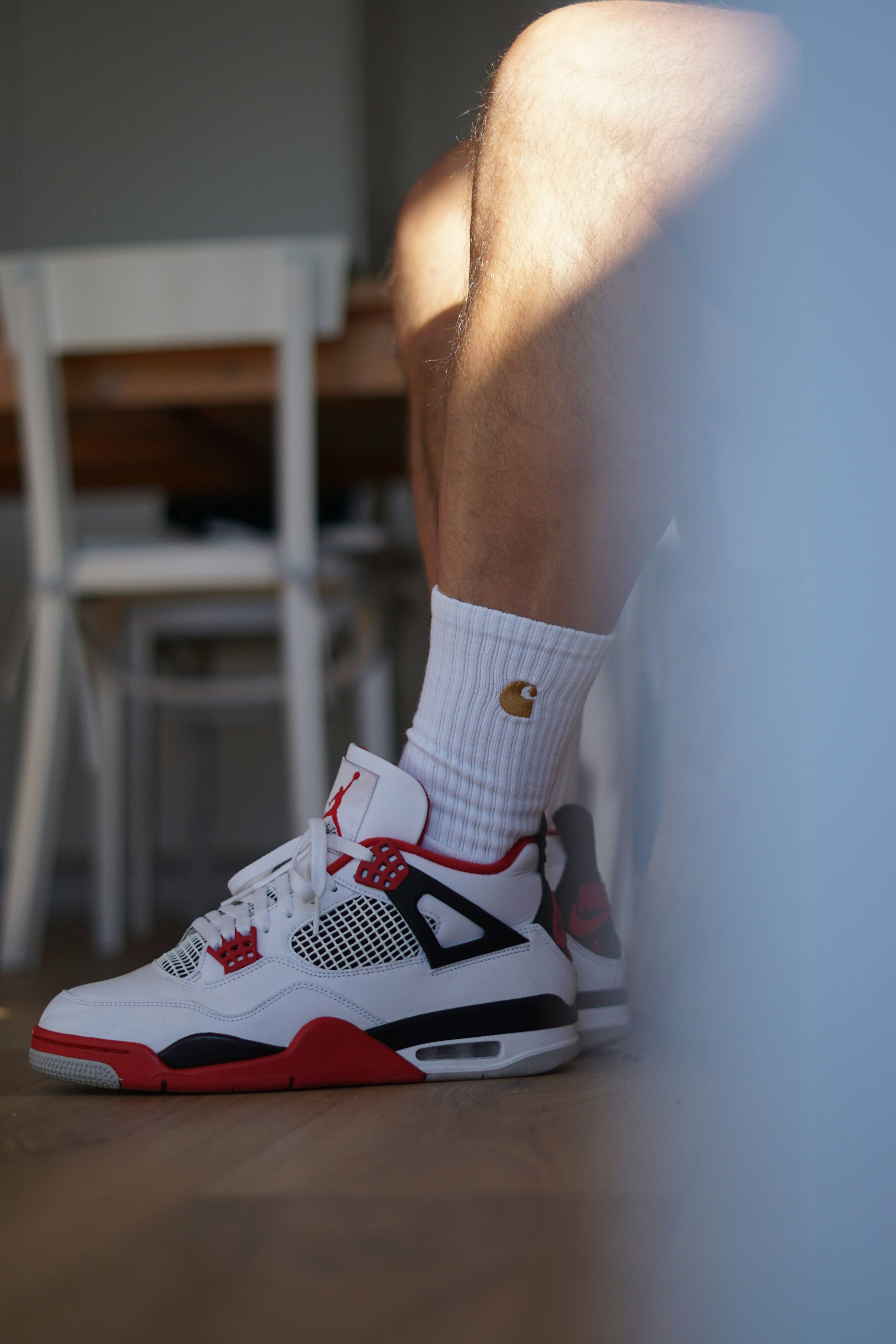 A person wearing white socks and red shoes photo Free Saussetles