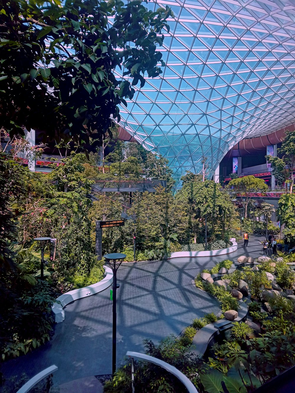 a view of the inside of a building from a walkway