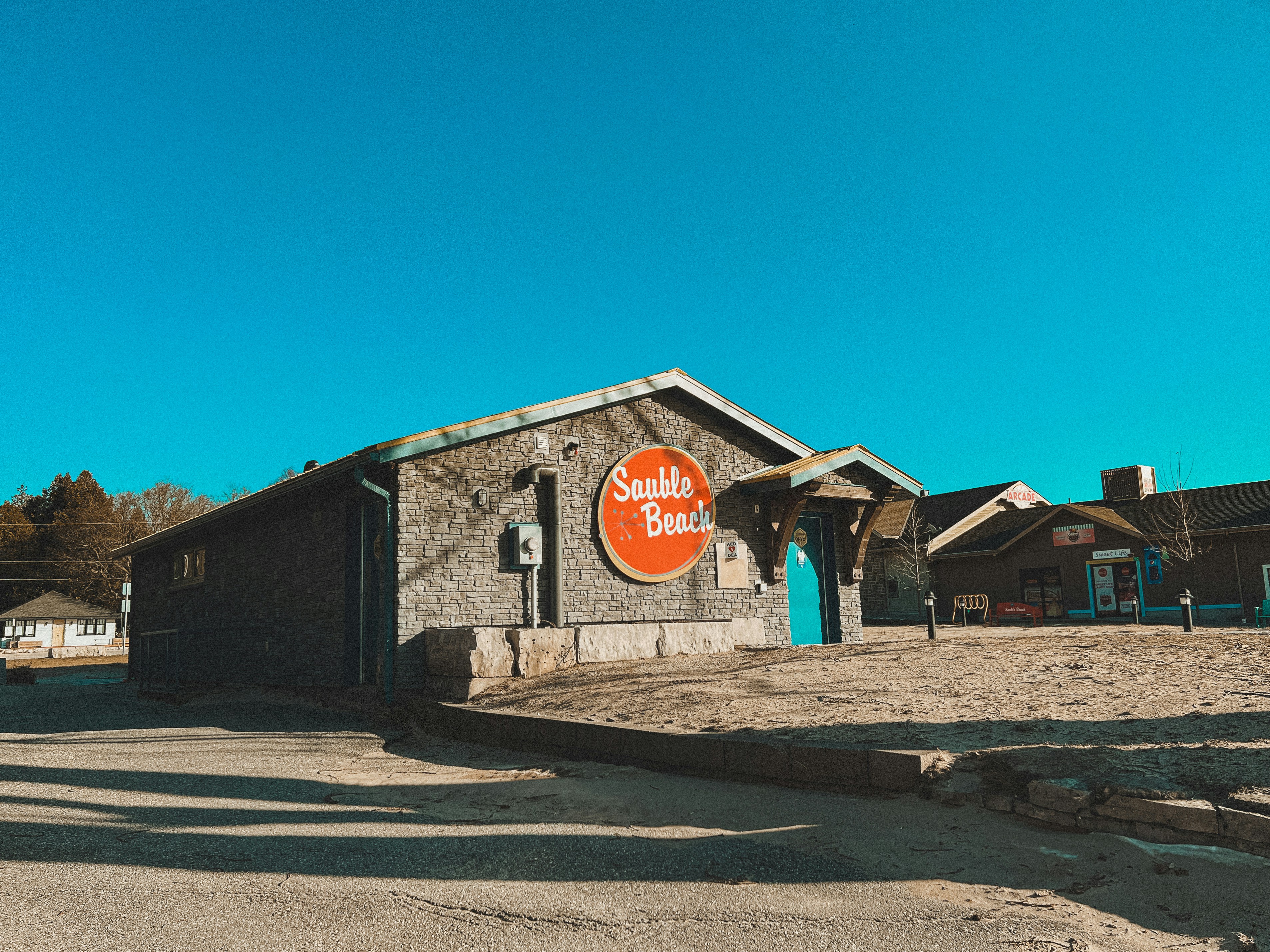 a small building with a sign on the front of it