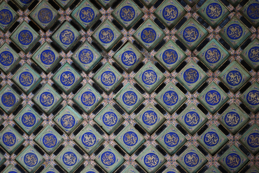 a close up of a blue and white tile pattern