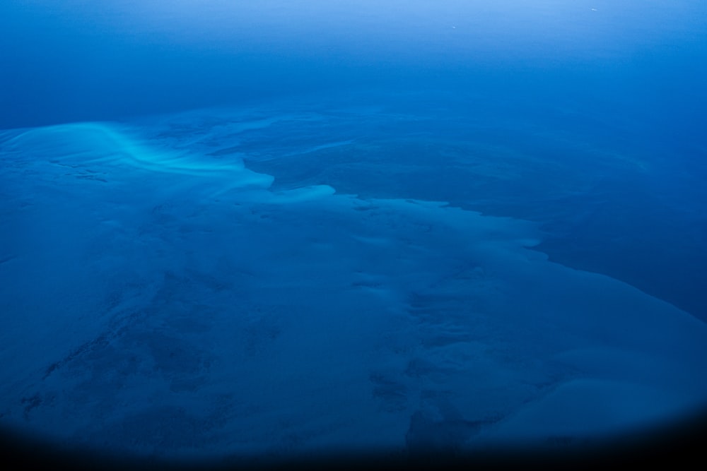 a view of the ocean from an airplane