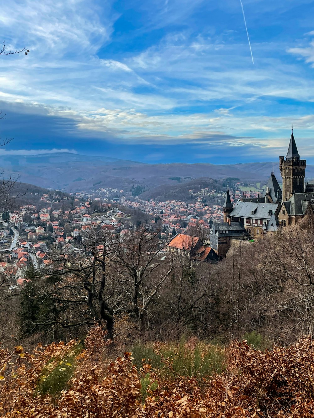 a view of a city from a hill