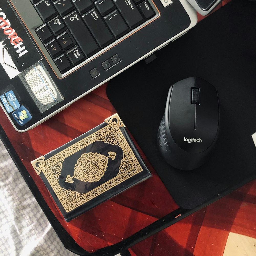 a computer mouse and a mouse pad on a desk