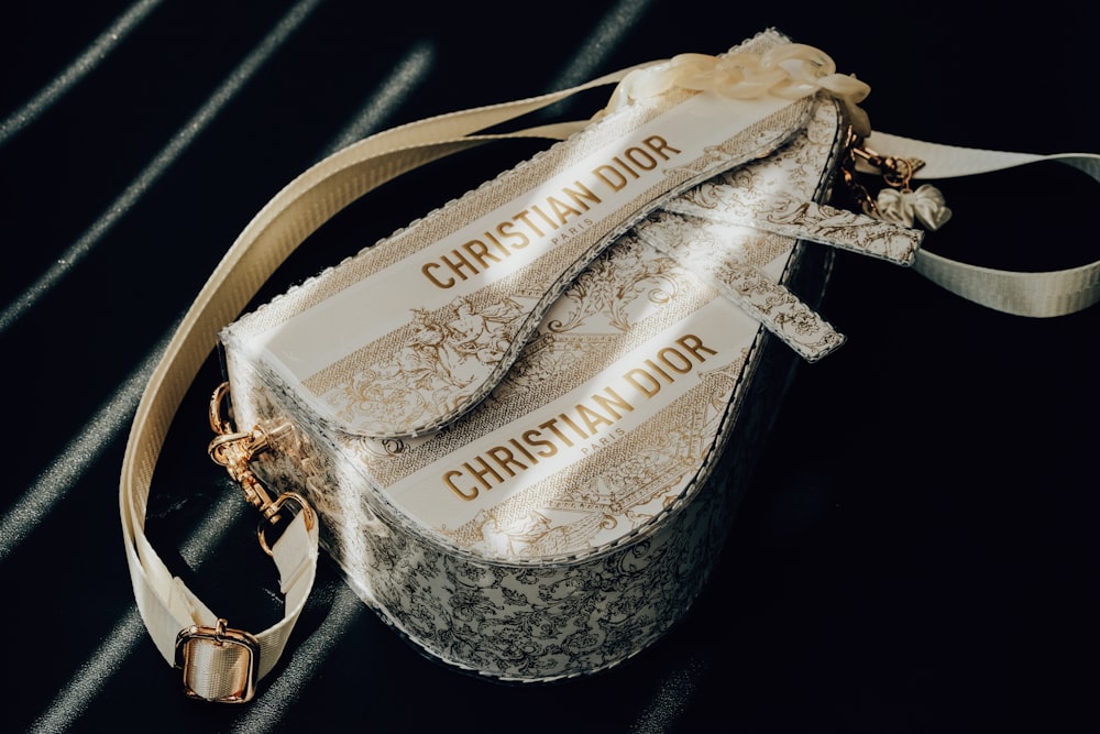 a bag with a name tag on it sitting on a table