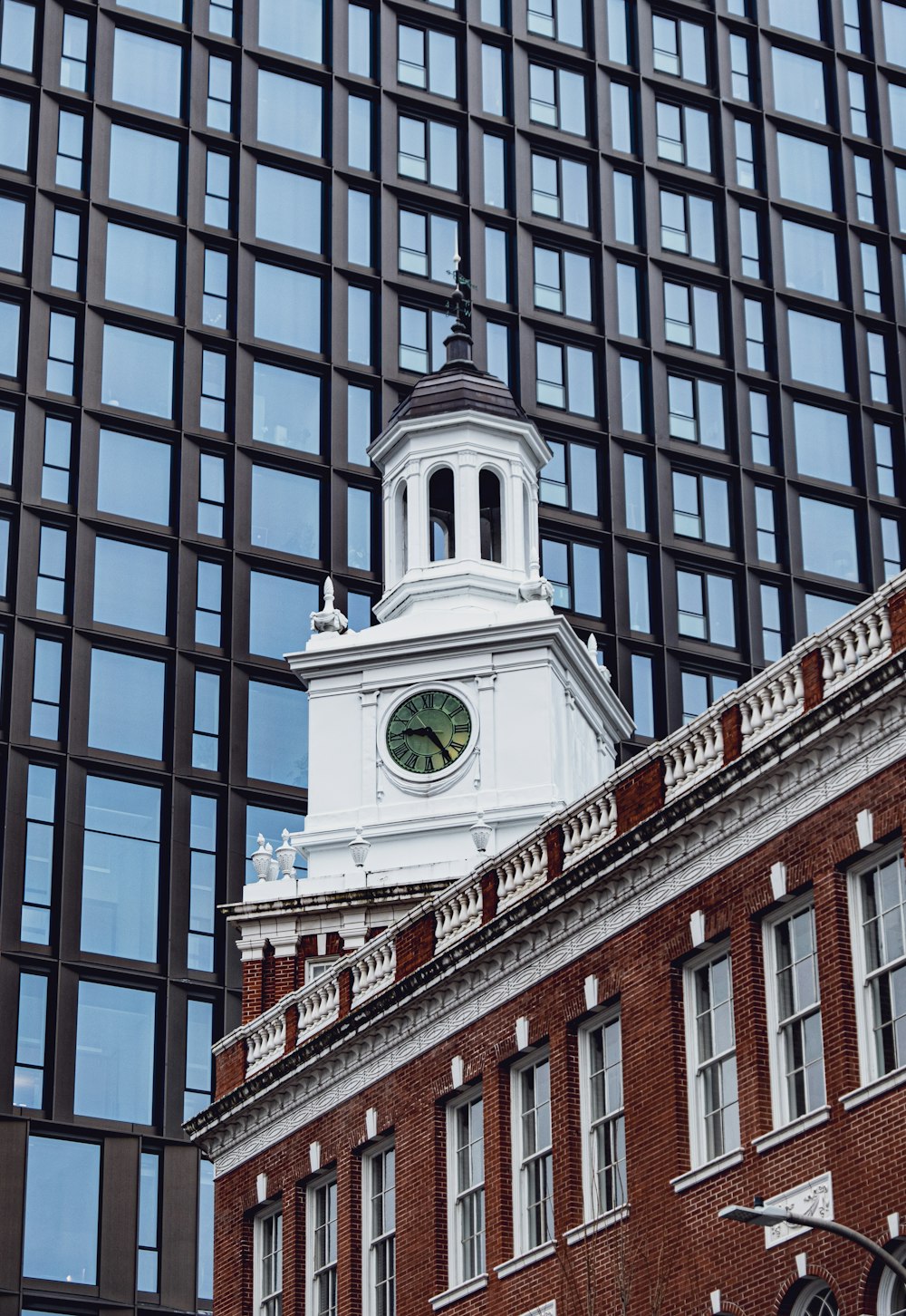 a clock tower on top of a brick building