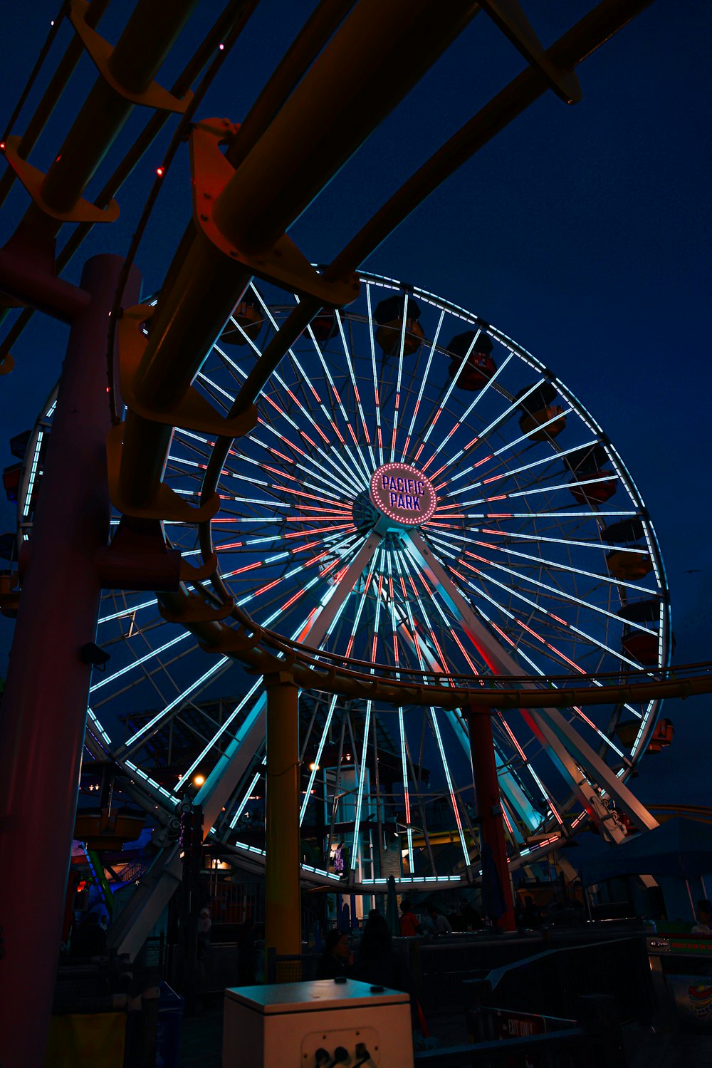 a large ferris wheel lit up at night