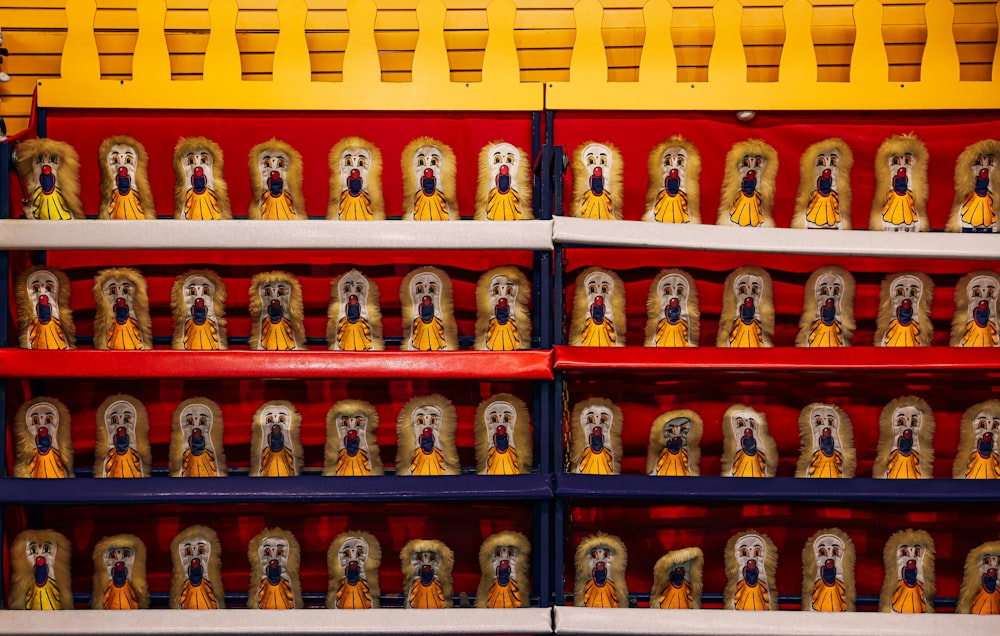 a shelf filled with lots of different types of figurines