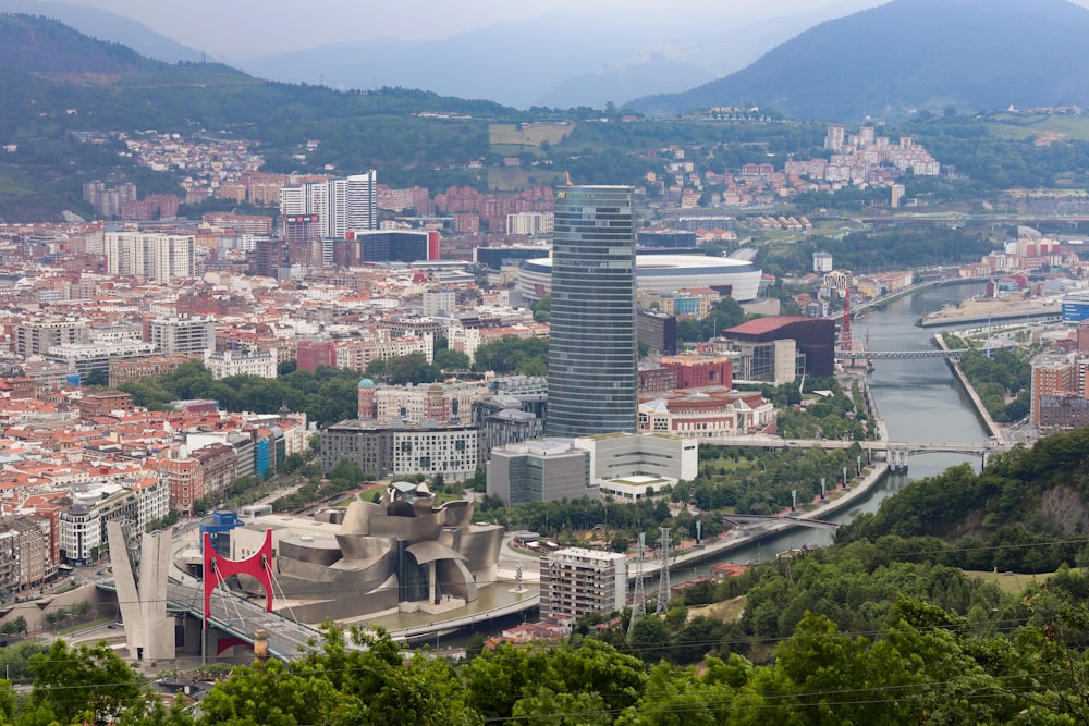 a view of a city with mountains in the background