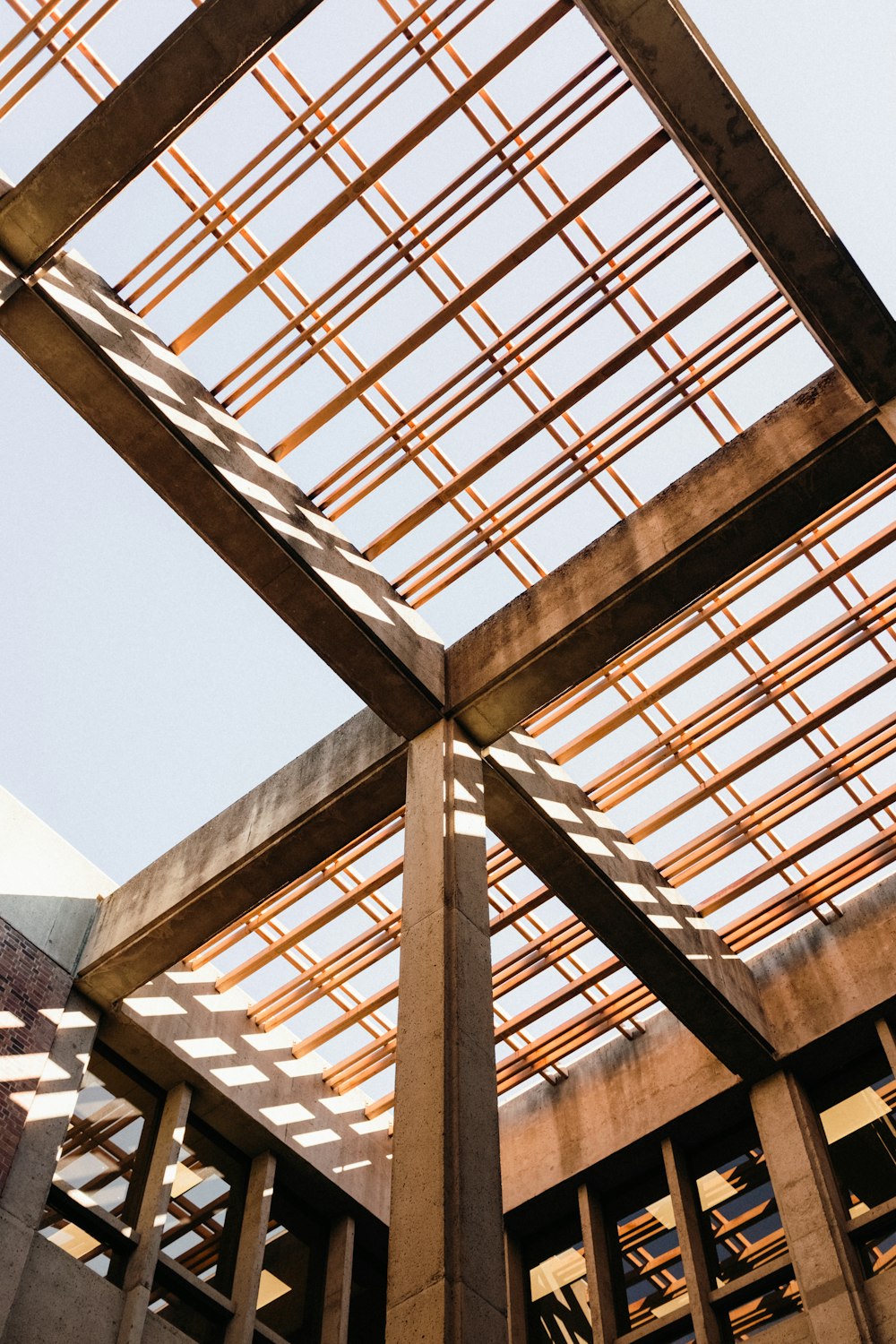 a close up of a metal structure with a sky background