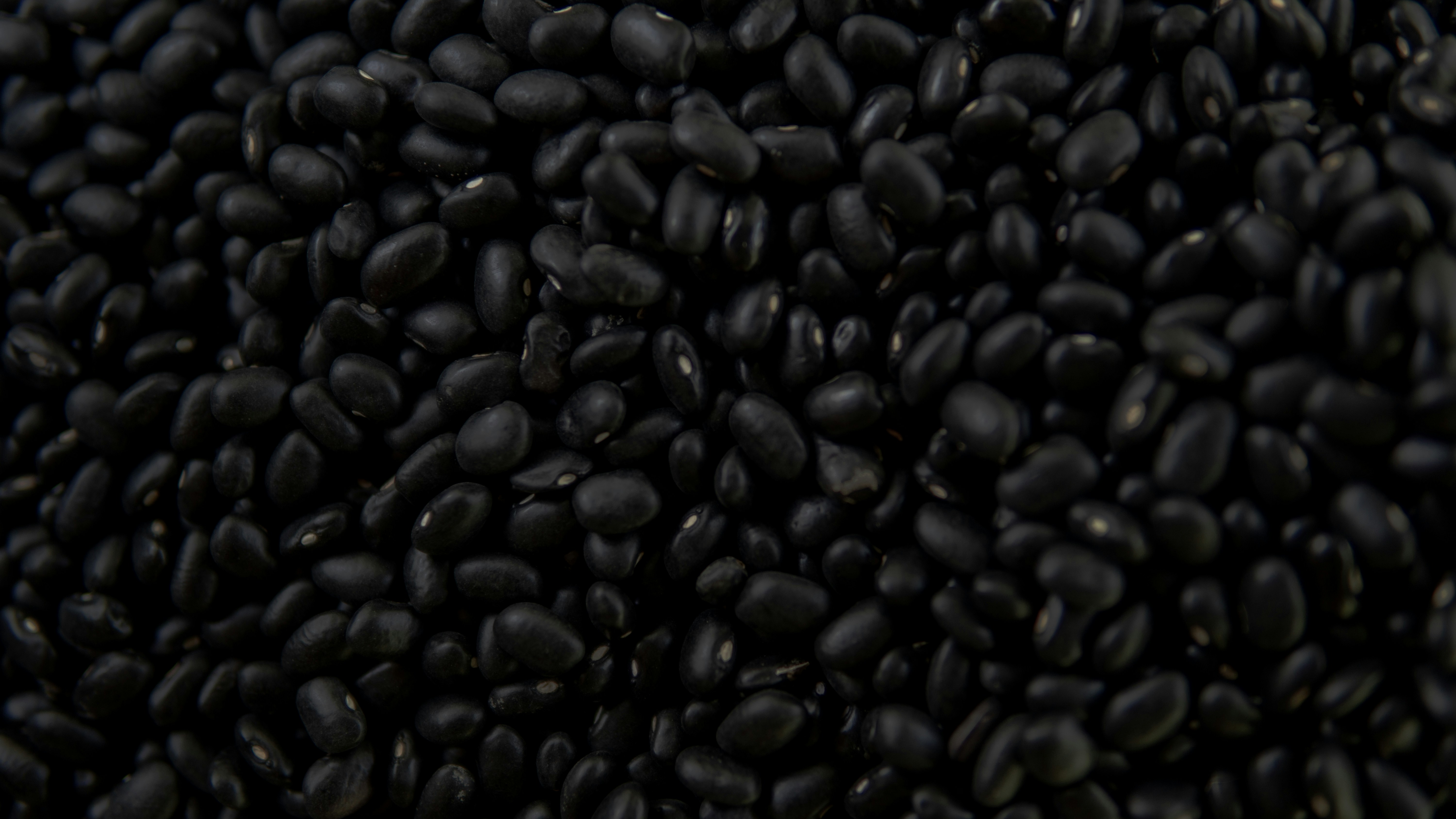 A pile of black beans sitting on top of a table photo – Free Grey Image on  Unsplash, image size:3000x1688