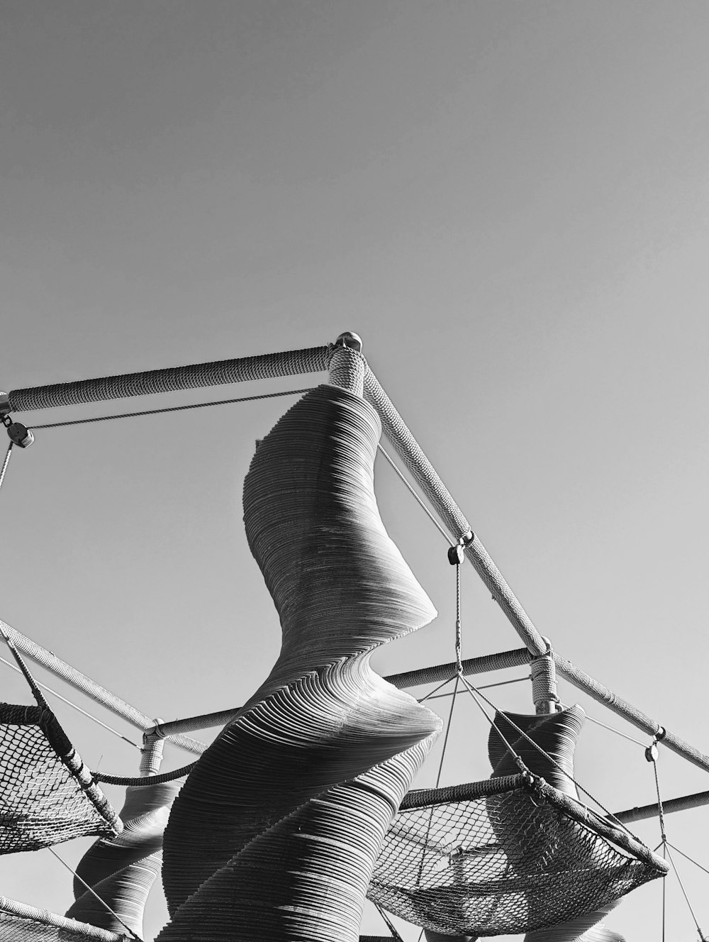 a black and white photo of a sculpture