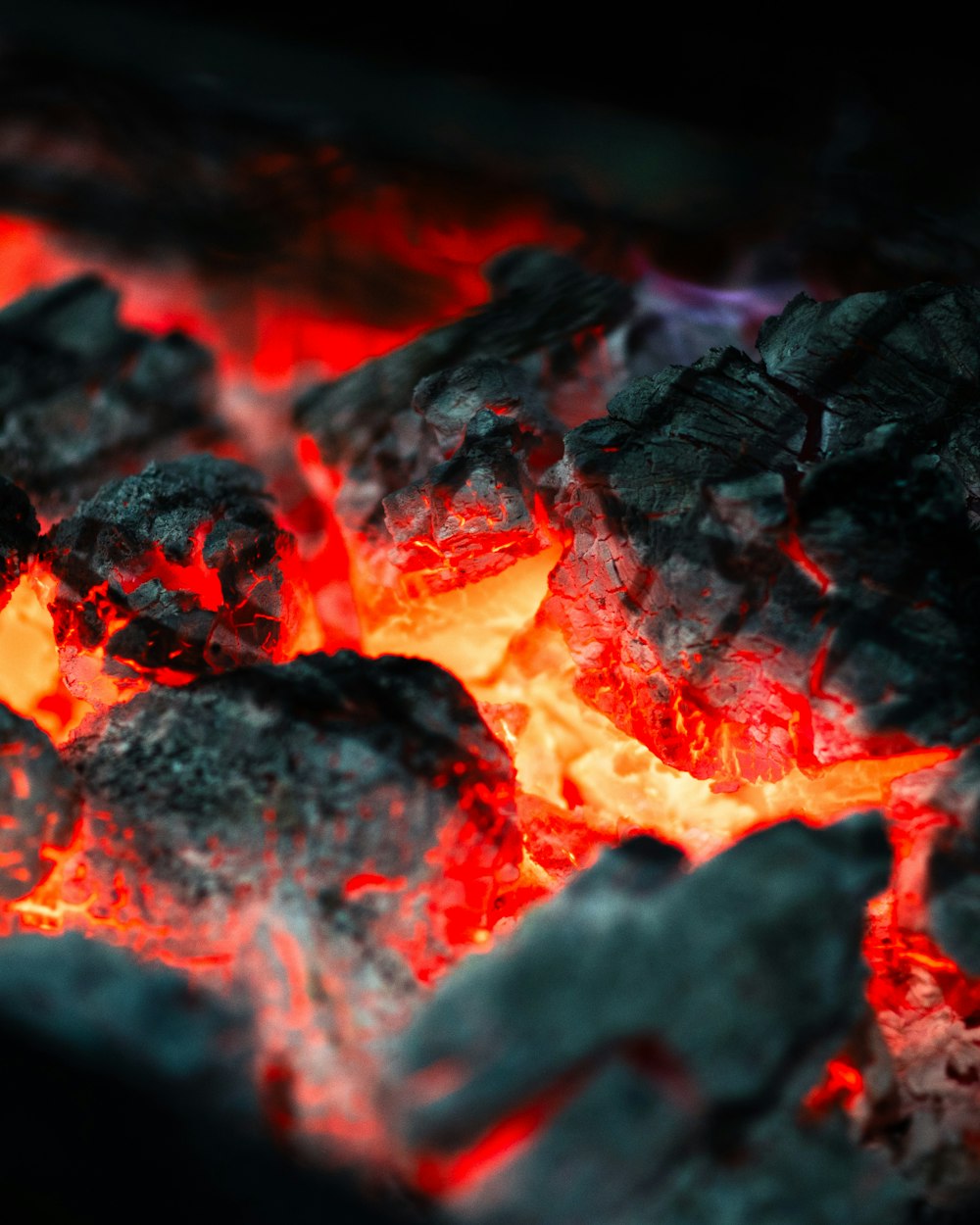 a close up of a hot coal grill