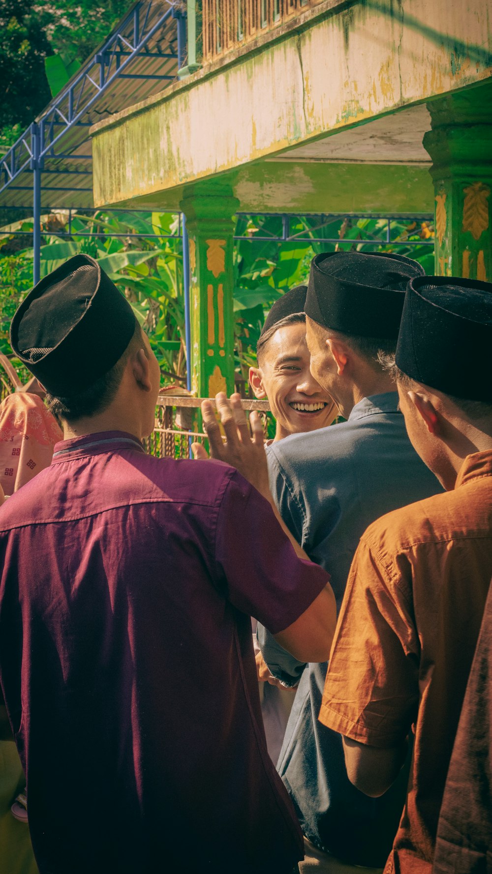 a group of men standing next to each other