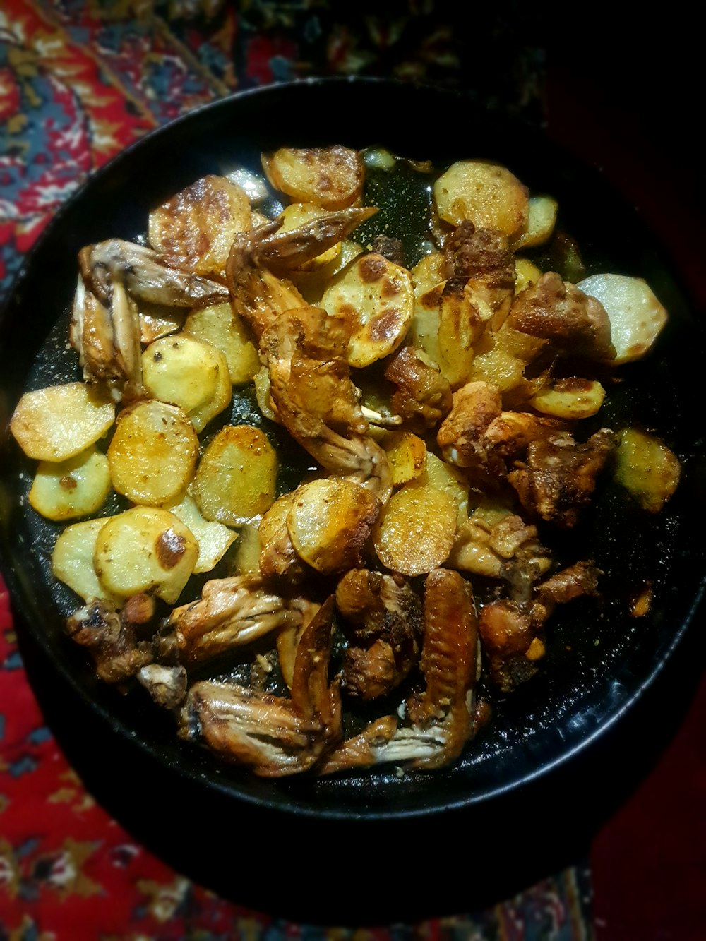 a pan filled with cooked food on top of a table