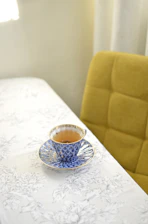 a cup of tea sitting on top of a table