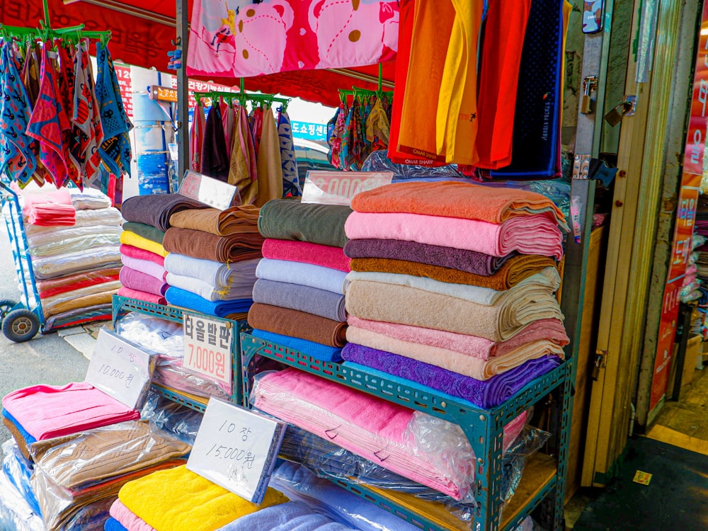 a display of folded towels in a store