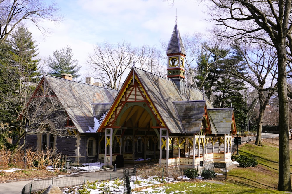 a church with a steeple and a clock tower