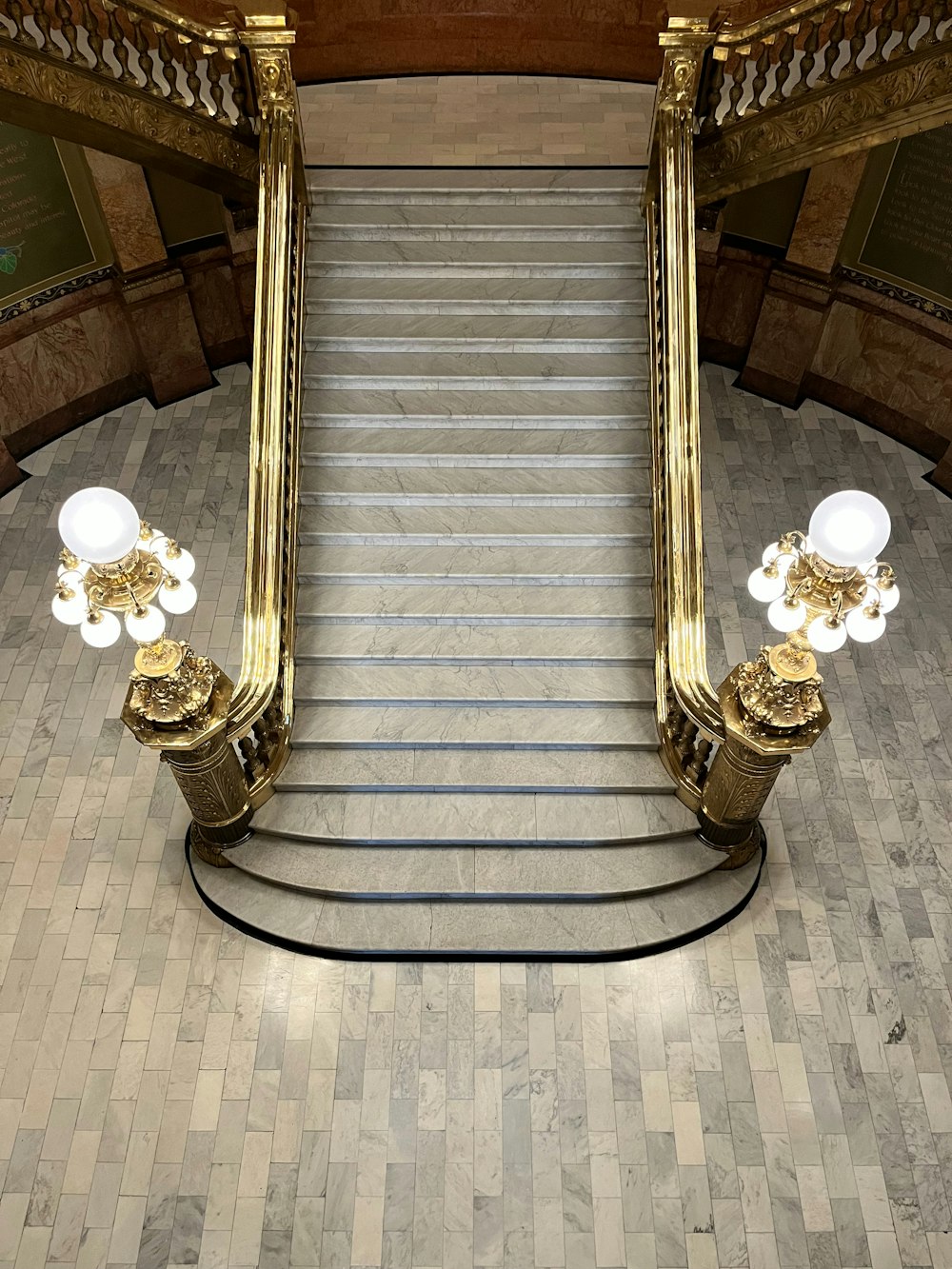 an escalator in a building with a bunch of lights on it