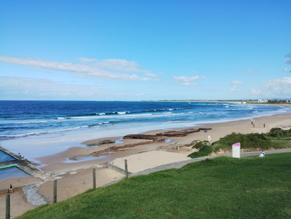 a view of a beach from a hill