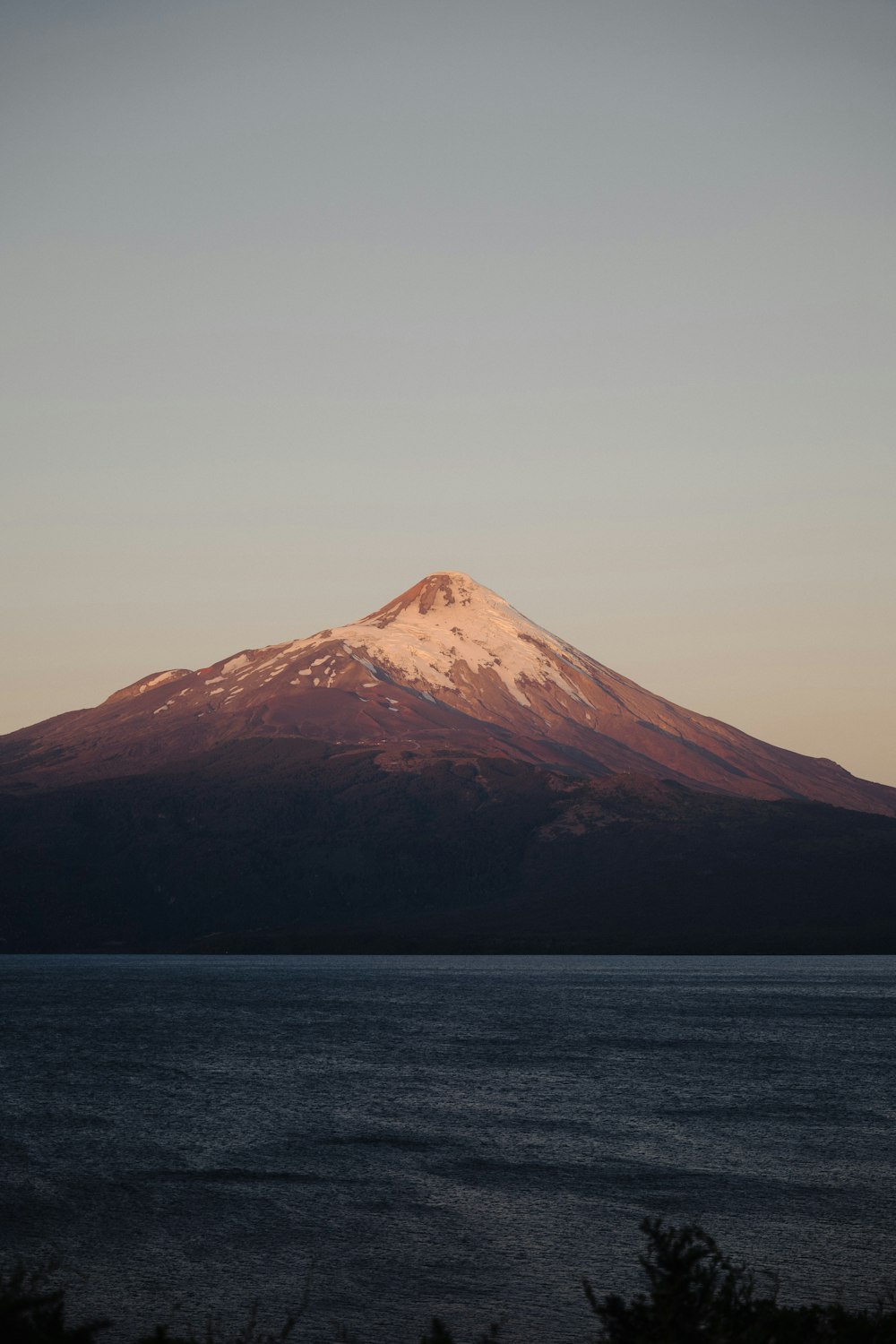 a mountain with snow on top of it