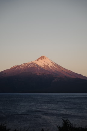 a mountain with snow on top of it