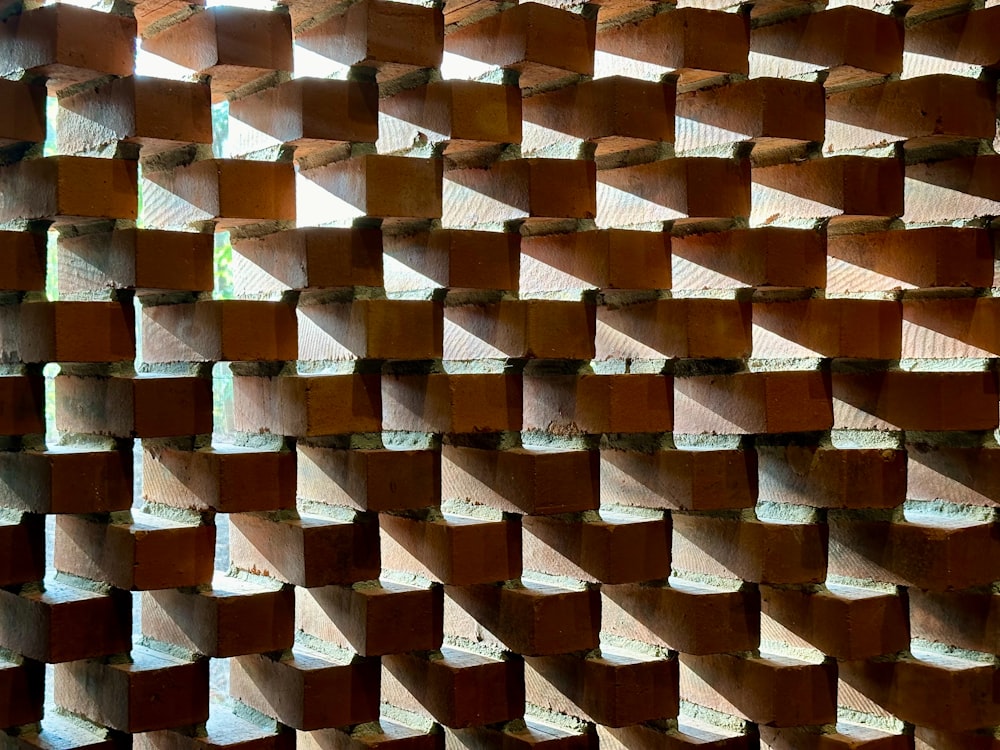 a close up of a wall made of wooden blocks