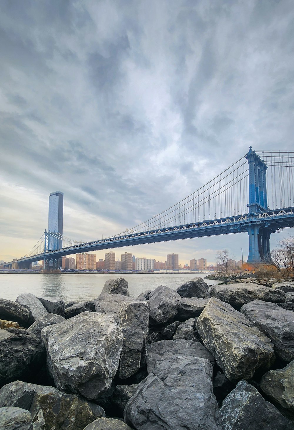 a view of a bridge over a body of water