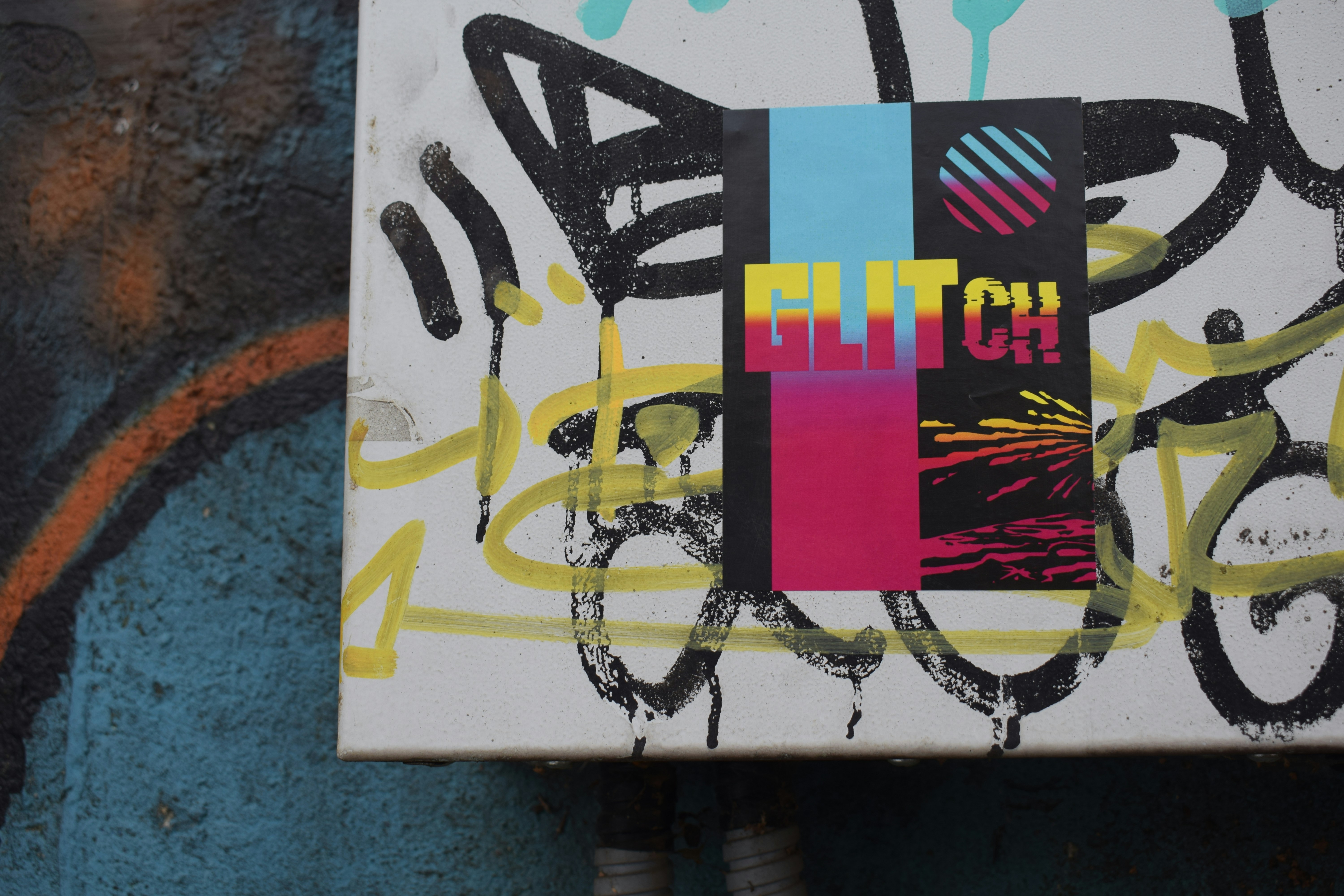 a white box with a colorful design on it