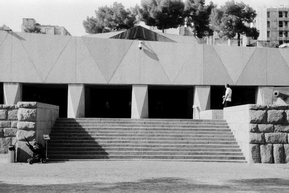 a black and white photo of a person on a skateboard