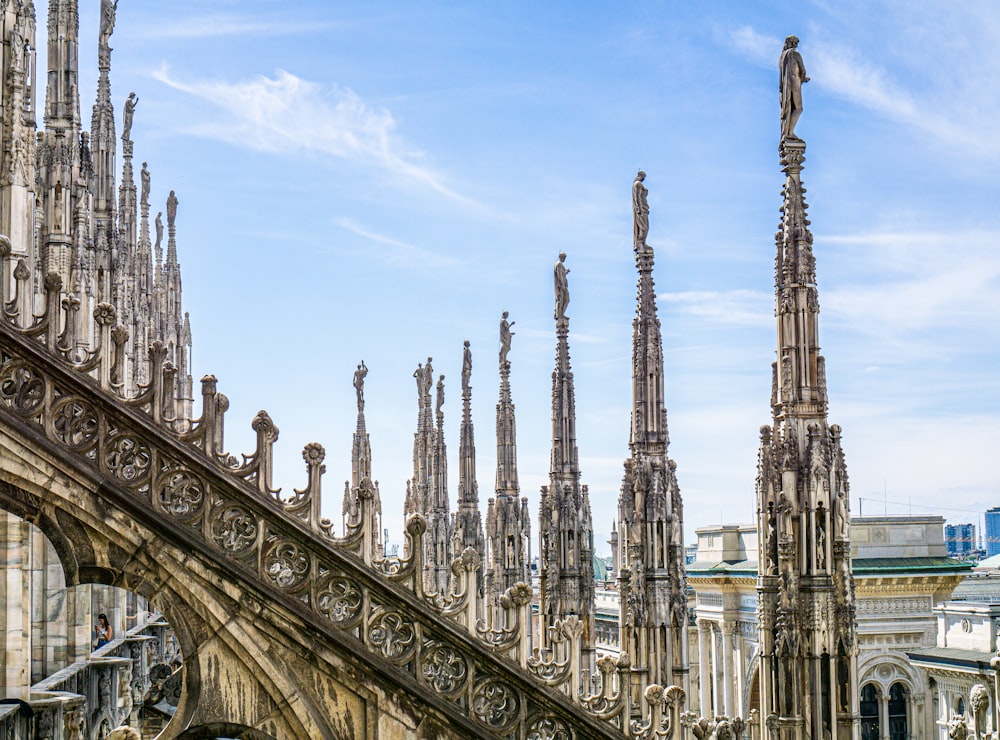 a large cathedral with many spires and a clock