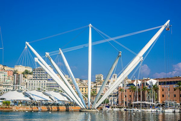 A large sail boat floating on top of a body of water — Genoa, Italy