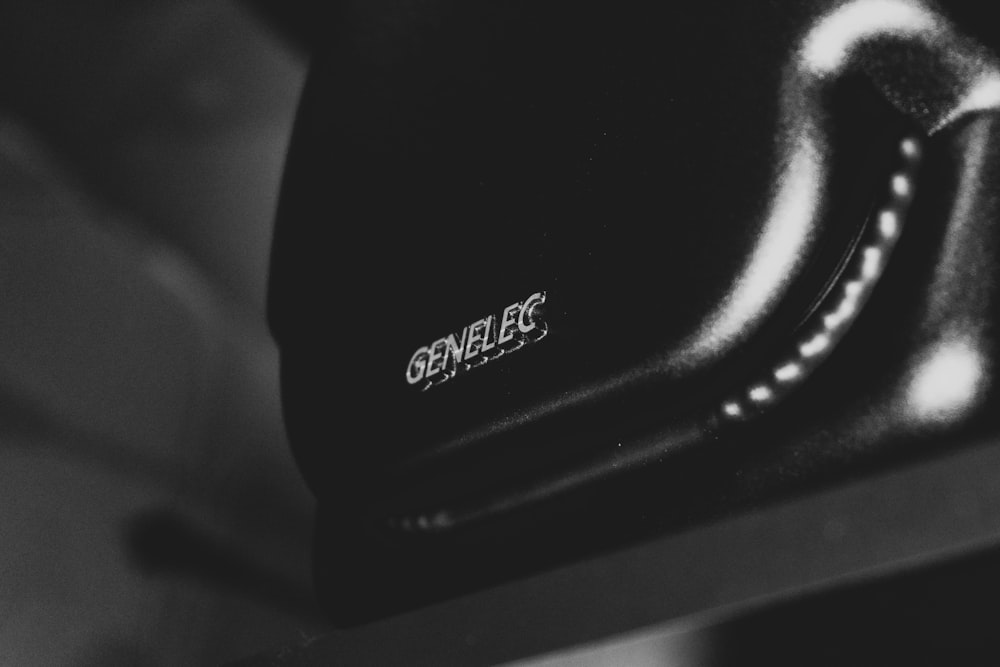 a close up of a black and white photo of a shoe