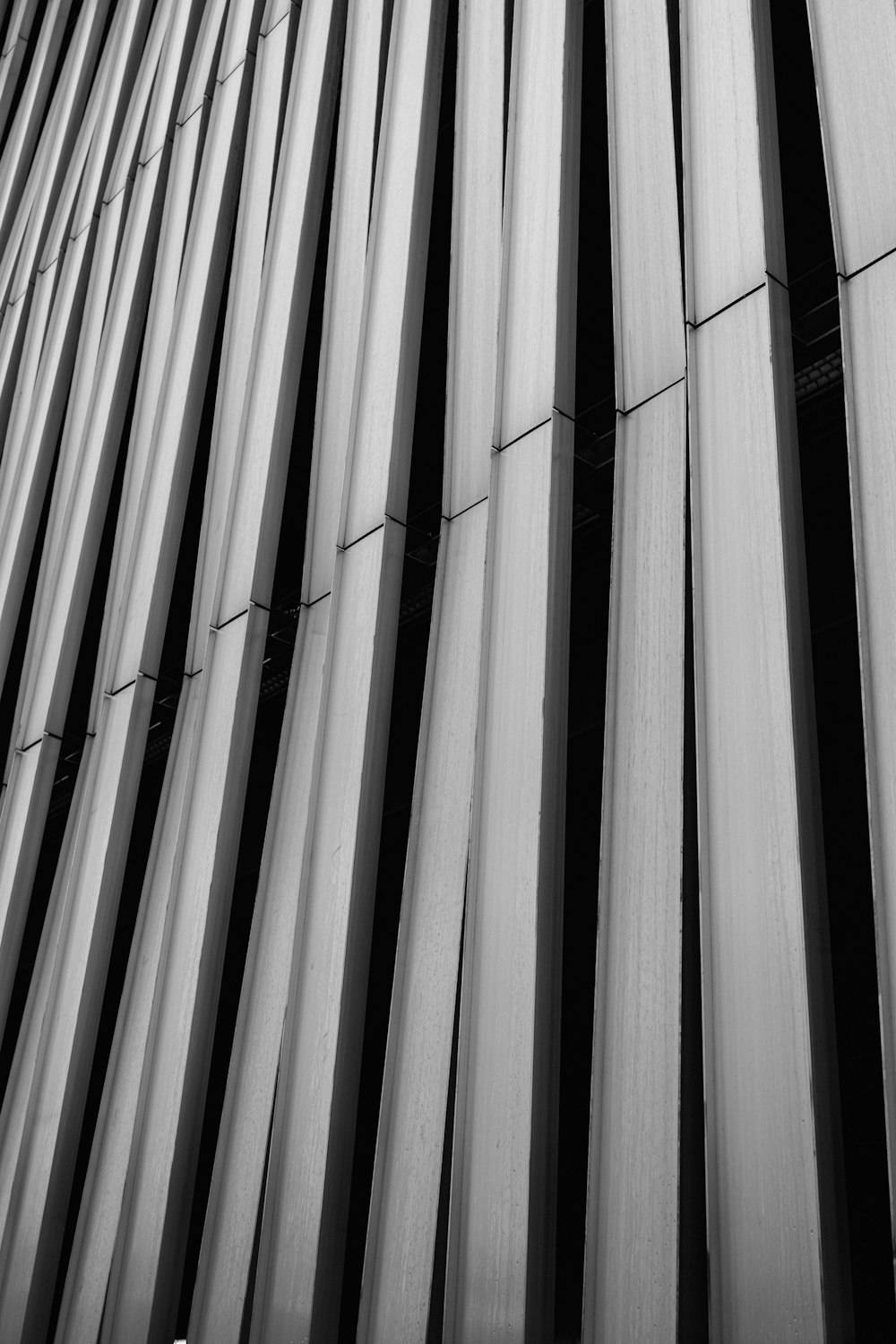 a black and white photo of the side of a building