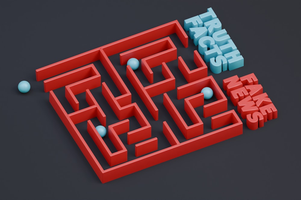 a red maze with a blue ball in the middle